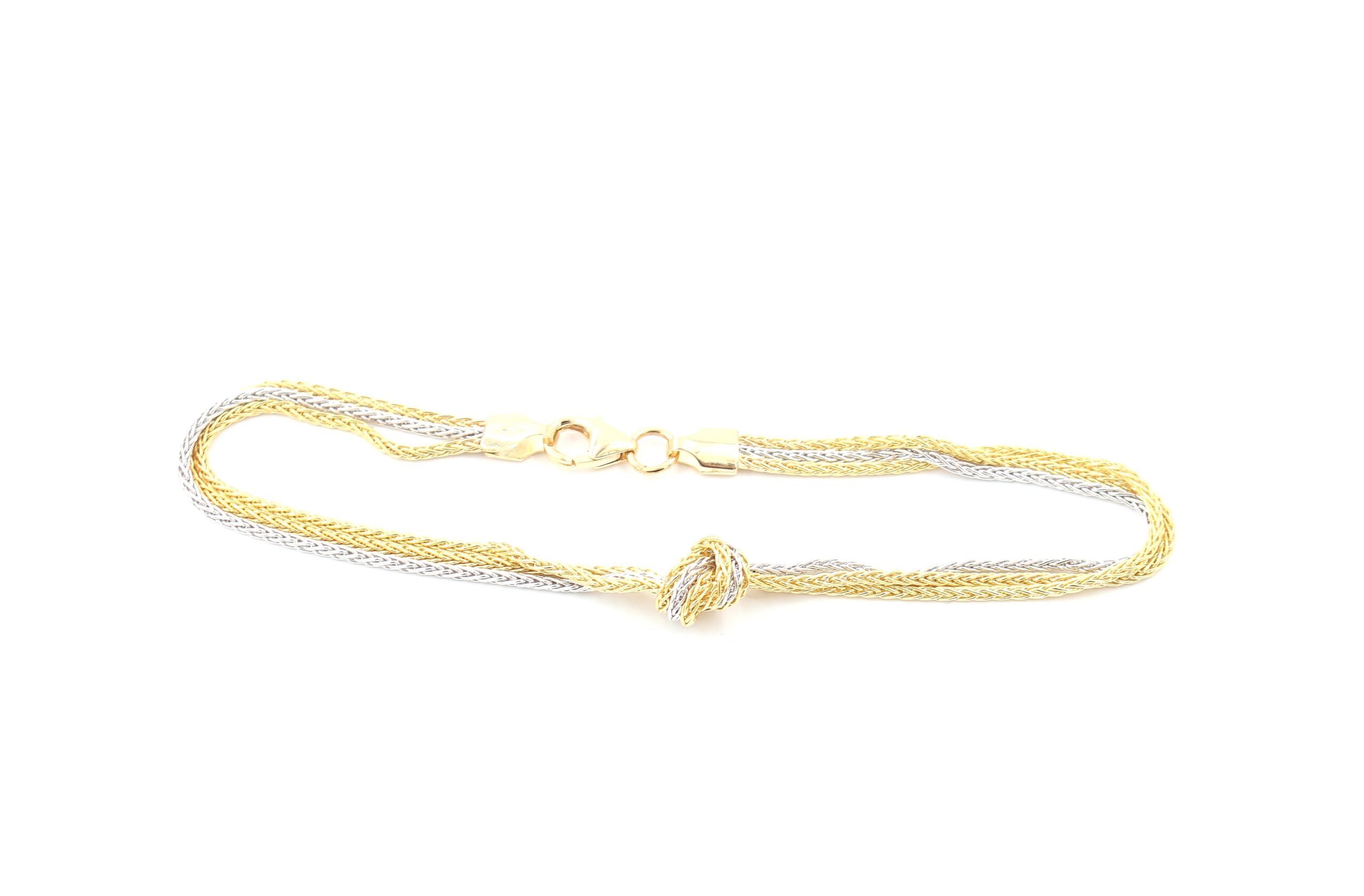 Armband i 18k guld och vitguld