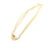 Armband i 18k guld och vitguld