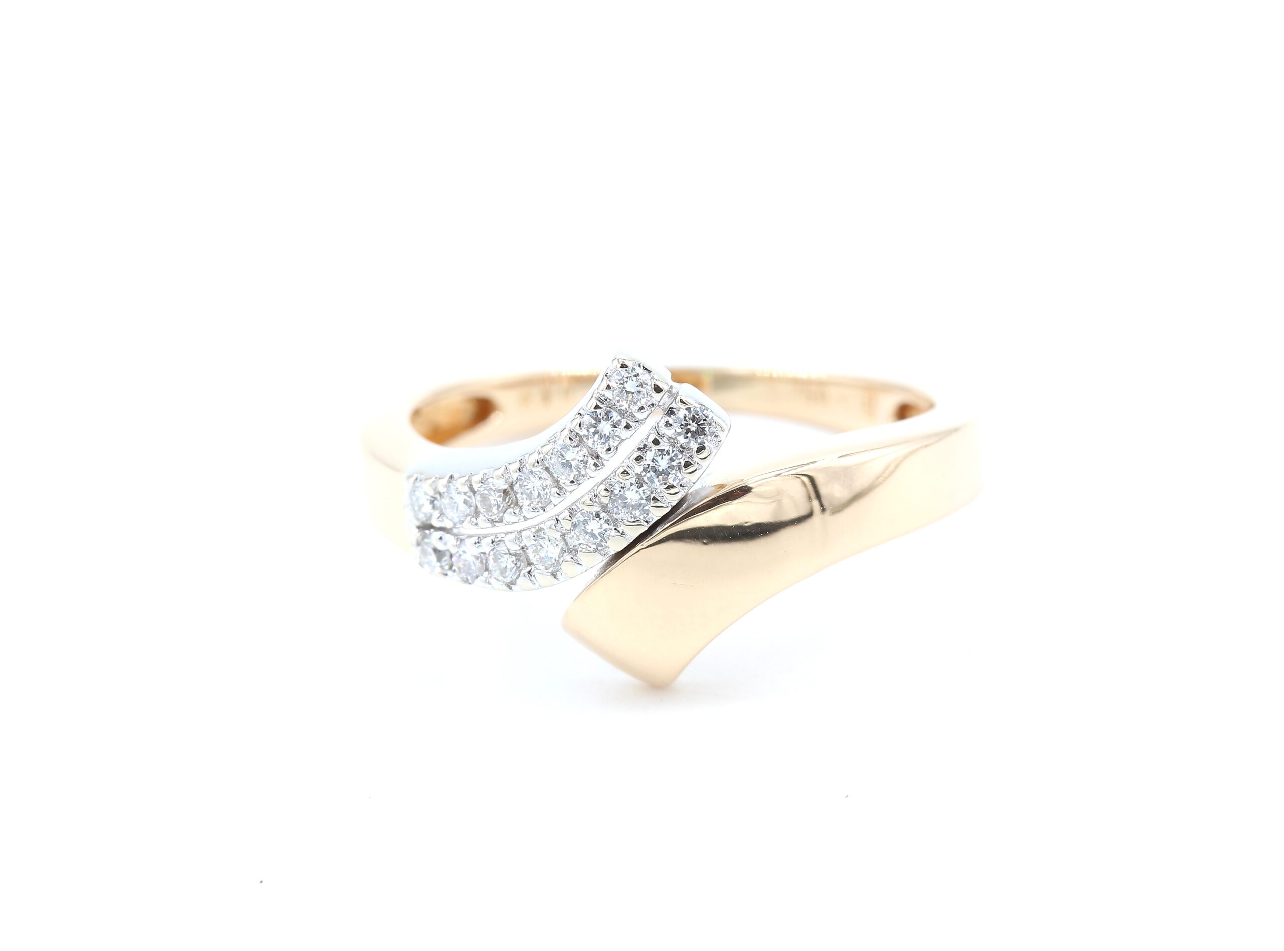 Diamantring i 18k guld och vitguld 0,20ct. vikt: 4,4g