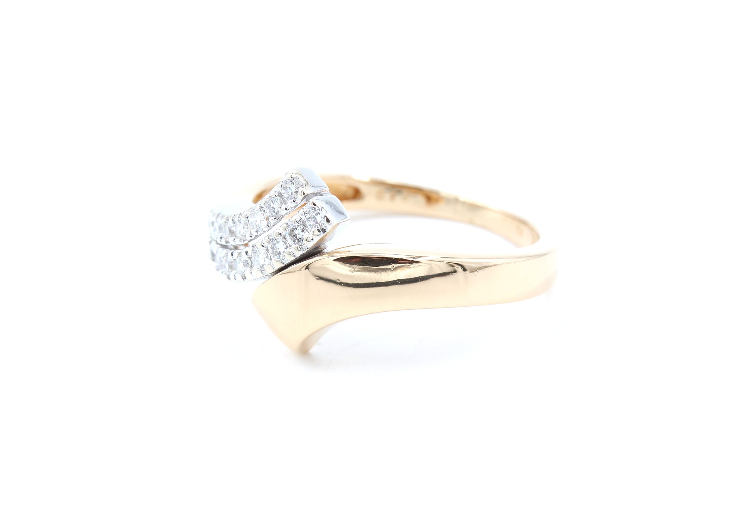 Diamantring i 18k guld och vitguld 0,20ct. vikt: 4,4g