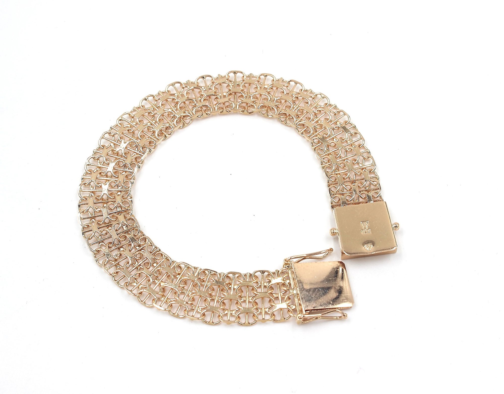 X-länk armband med stavar i 18k guld 3x. vikt:14,7 g