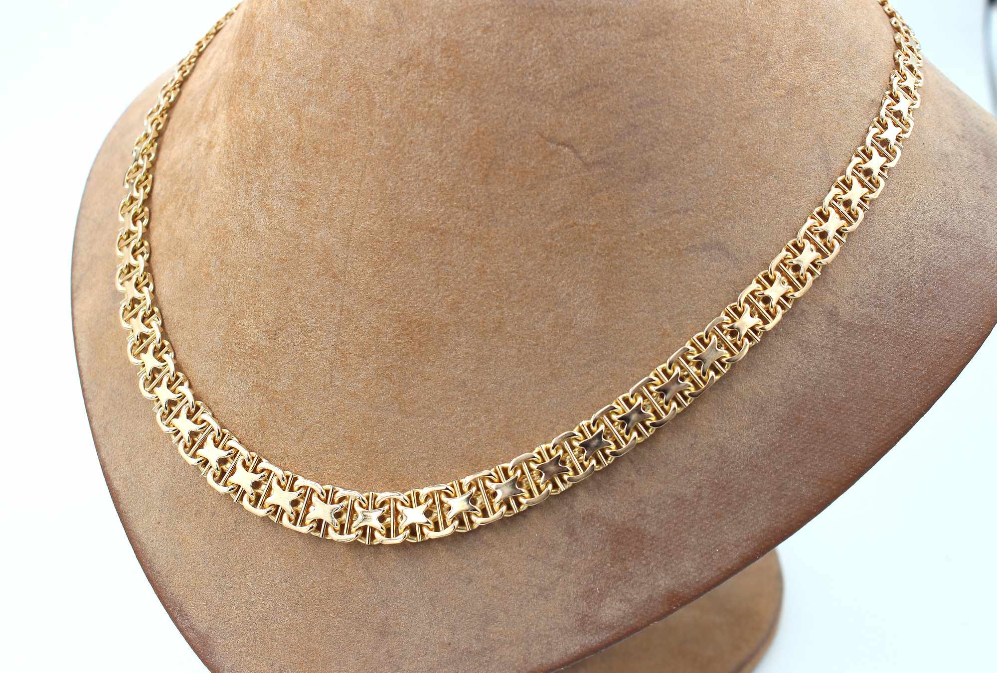 X-länk halsband med stavar i 18k guld. vikt: 29,95g