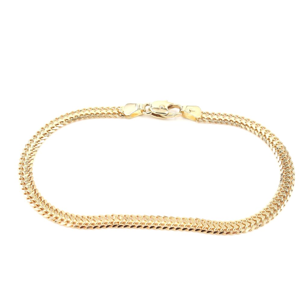 Fiskben armband i 18k guld . vikt: 5,56g