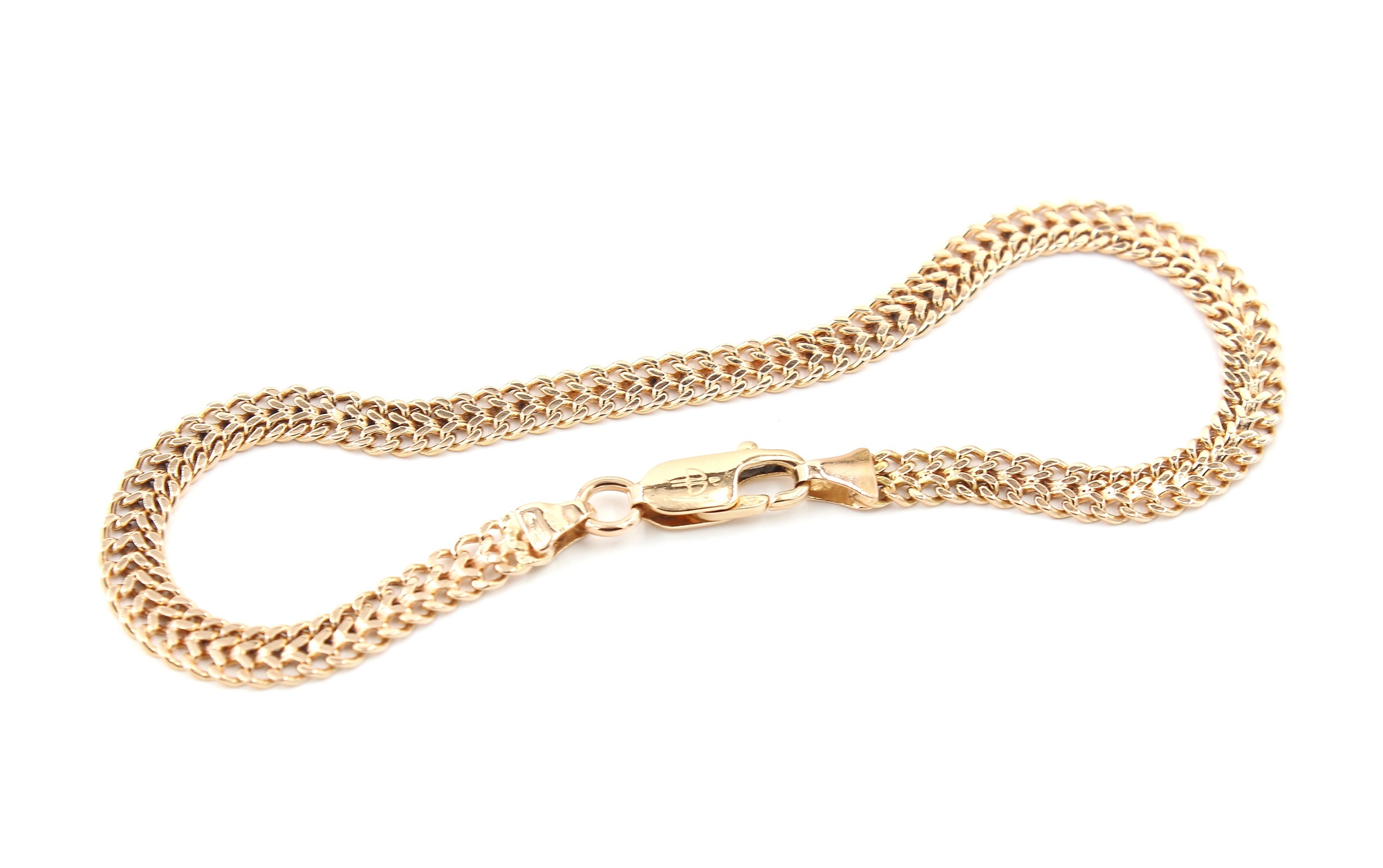 Fiskben armband i 18k guld . vikt: 5,58g