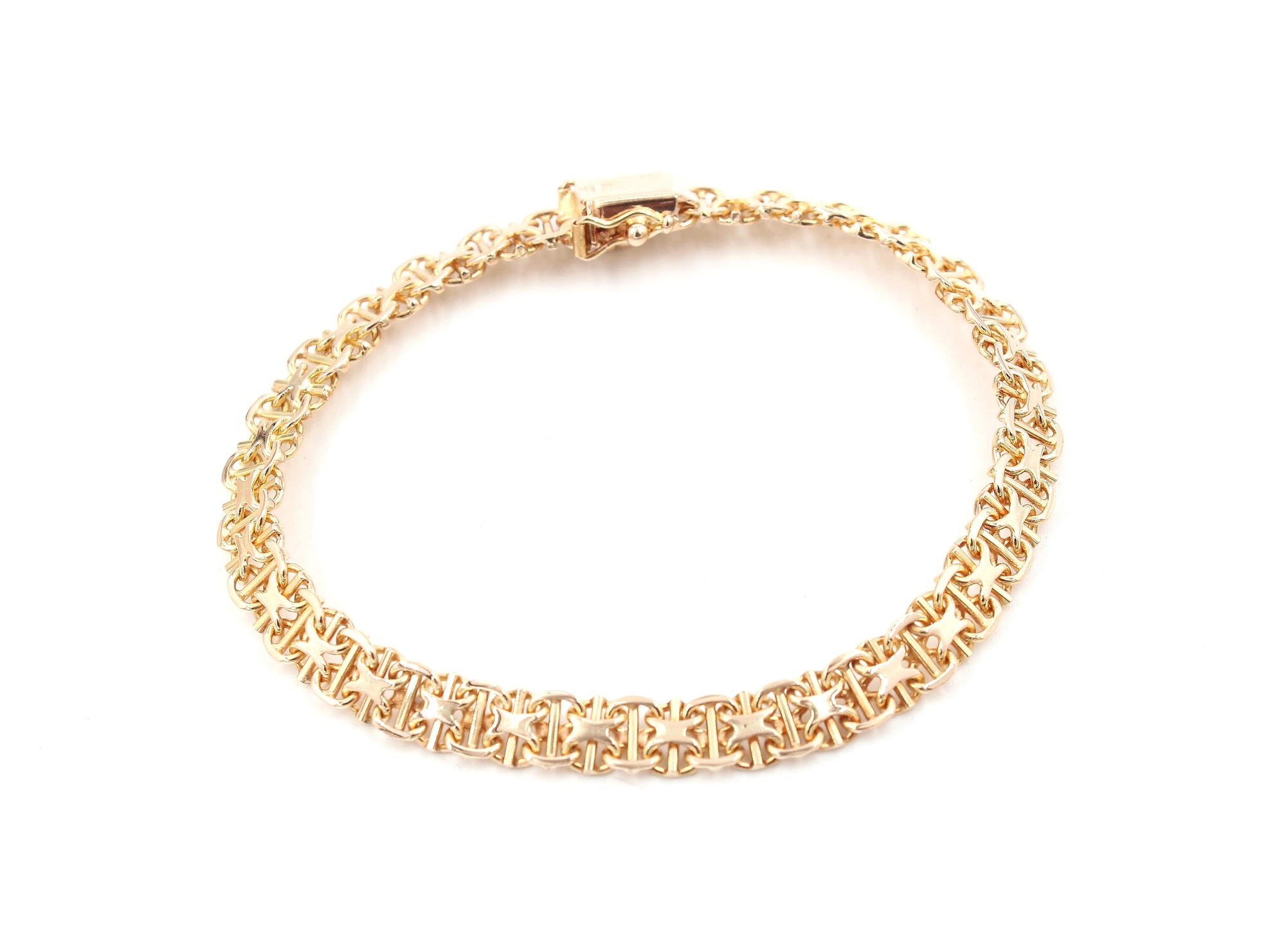 X-länk armband med stavar i 18k guld .vikt: 10,2g