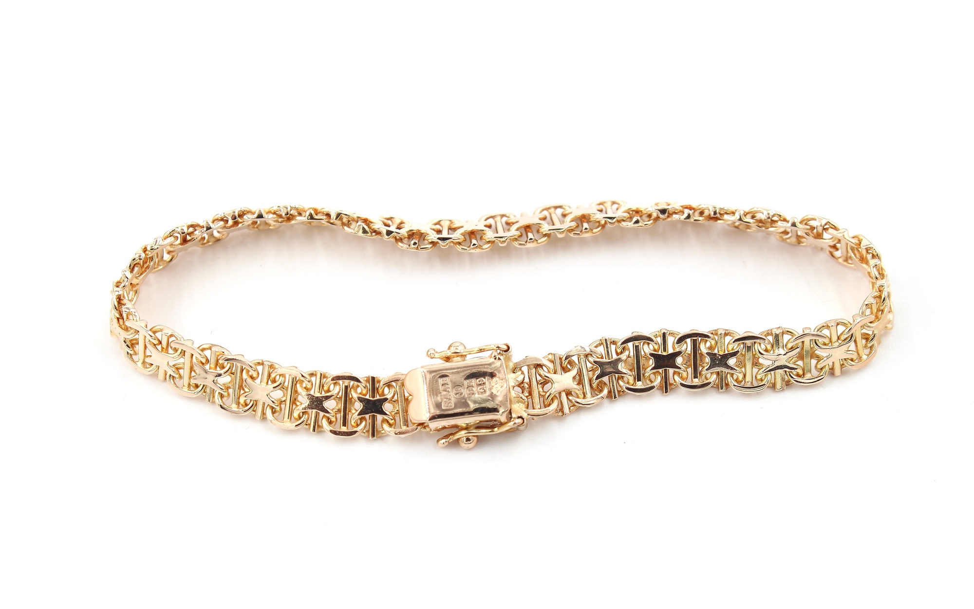 X-länk armband med stavar i 18k guld .vikt: 10,2g