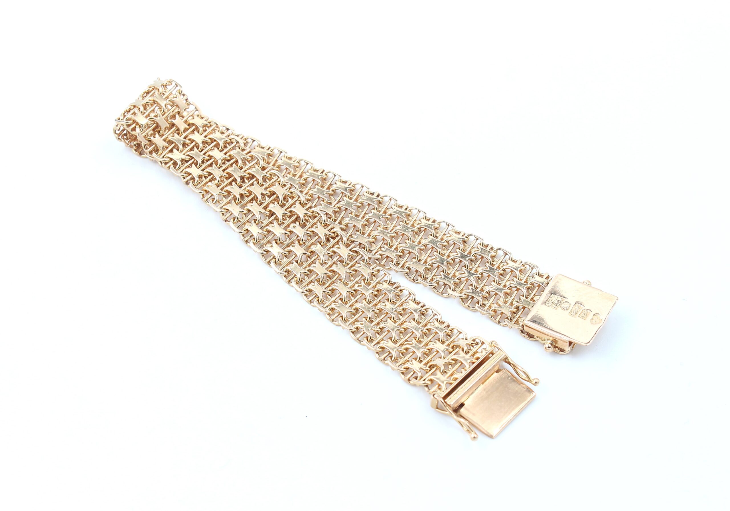 X-länk armband med stavar i 18k guld 4x. vikt: 25,55g