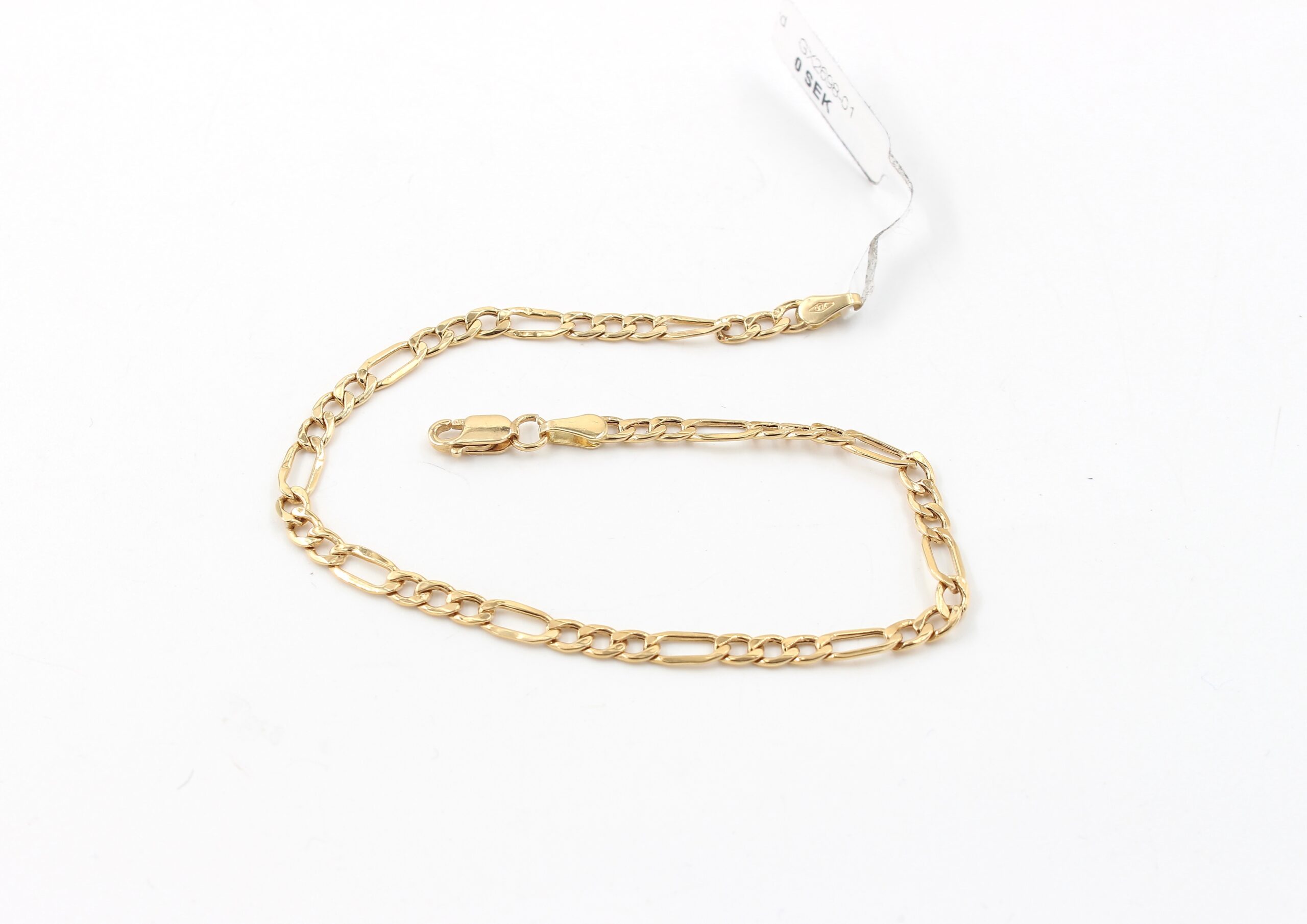 Figaro armband i 18k guld. ihålig