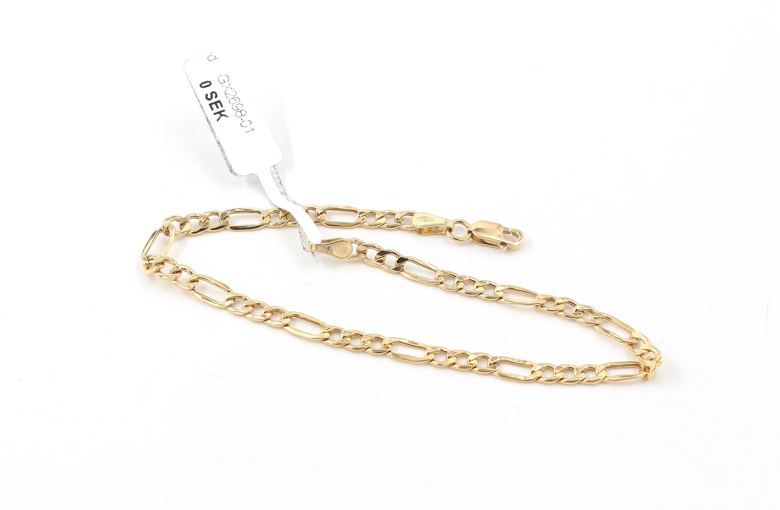 Figaro armband i 18k guld. ihålig