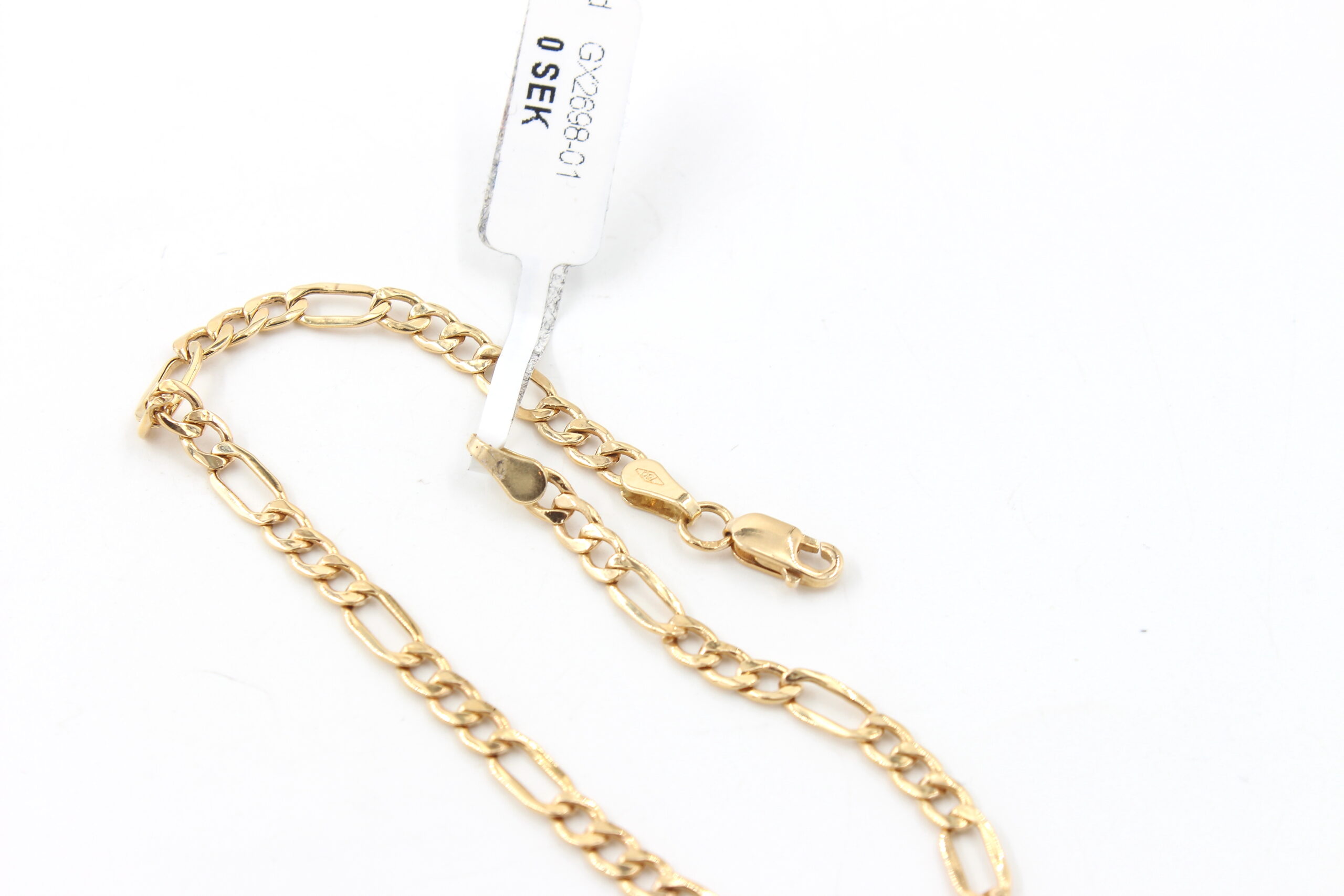 Figaro armband i 18k guld. ihålig
