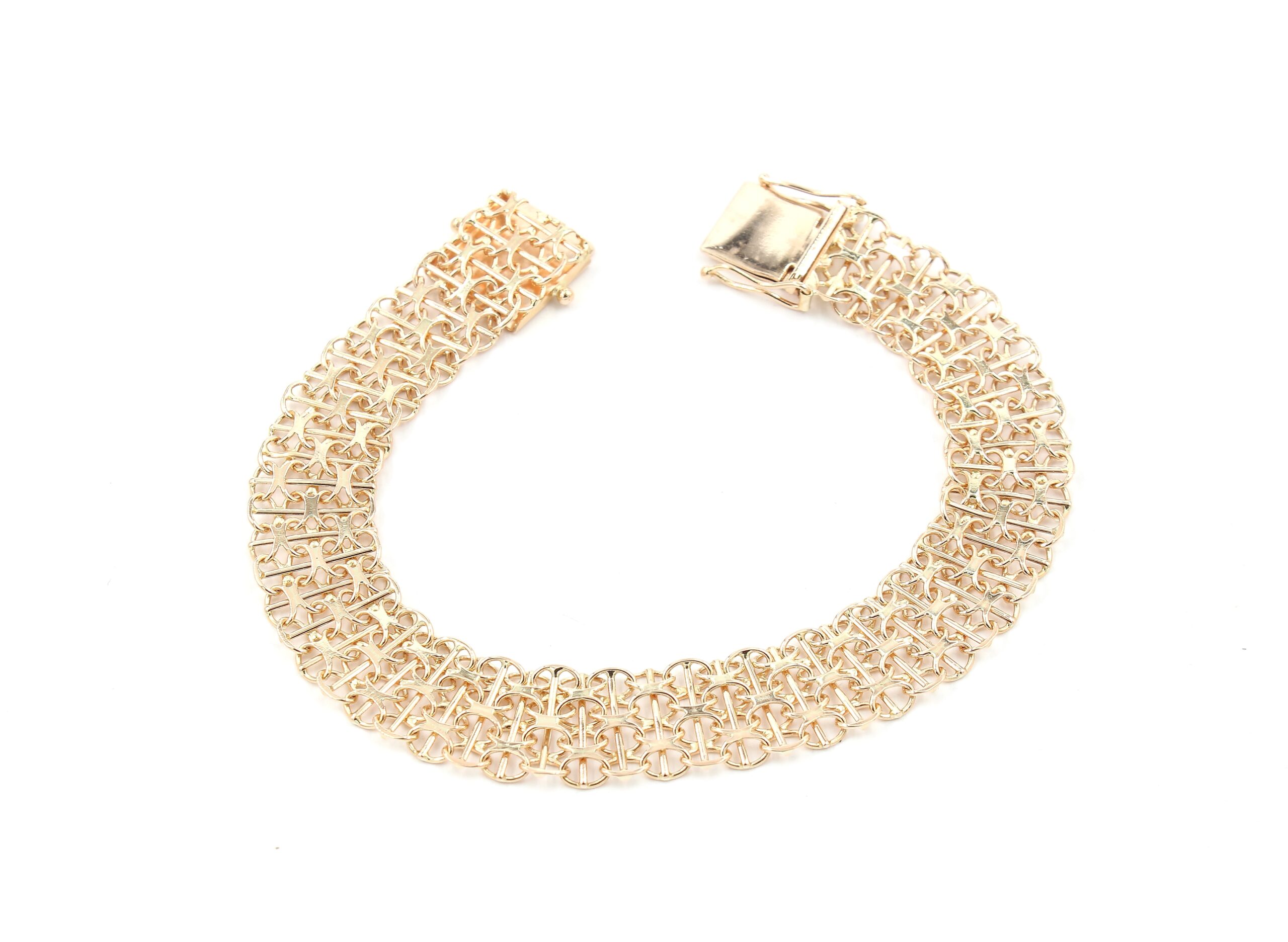 X-länk armband med stavar i 18k guld 3x. vikt: 13,6g