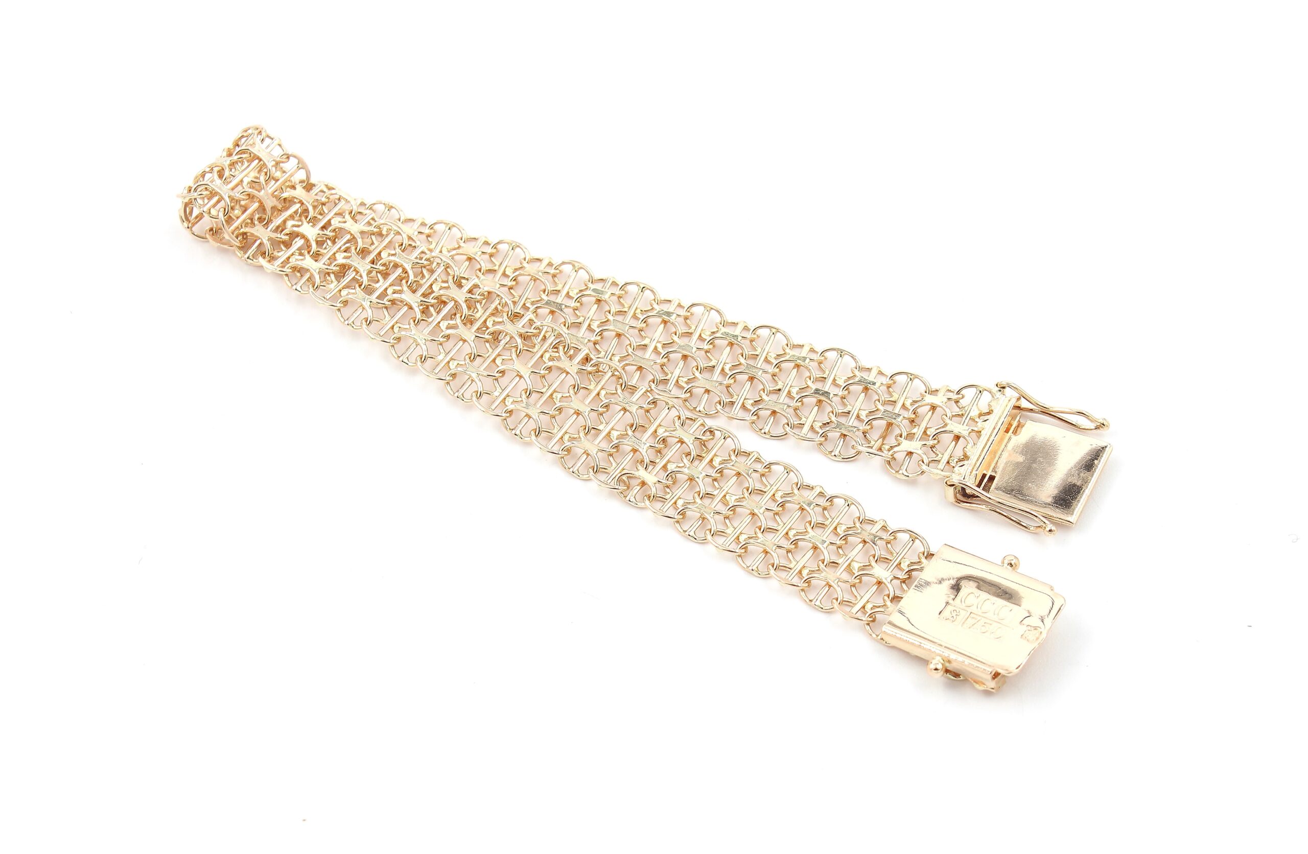 X-länk armband med stavar i 18k guld 3x. vikt: 13,6g
