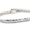 Armband i 18k vitguld med topaz stenar